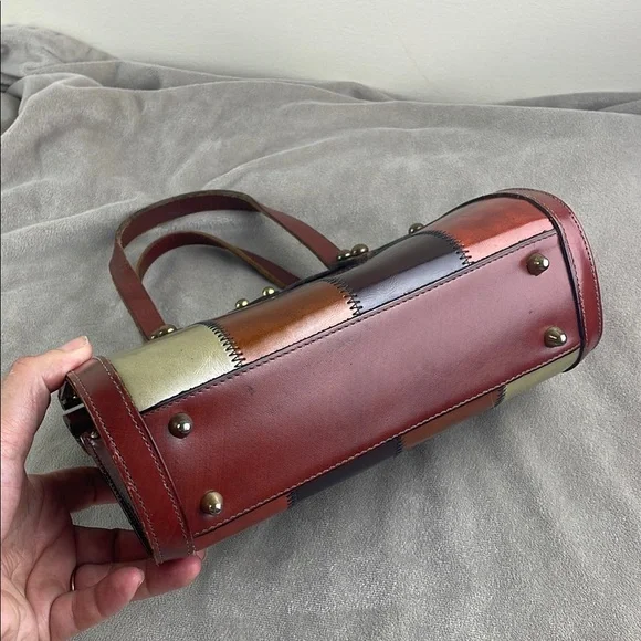 Vintage Brown Satchel with Structured Design and Metal Accents - Picture 4 of 15